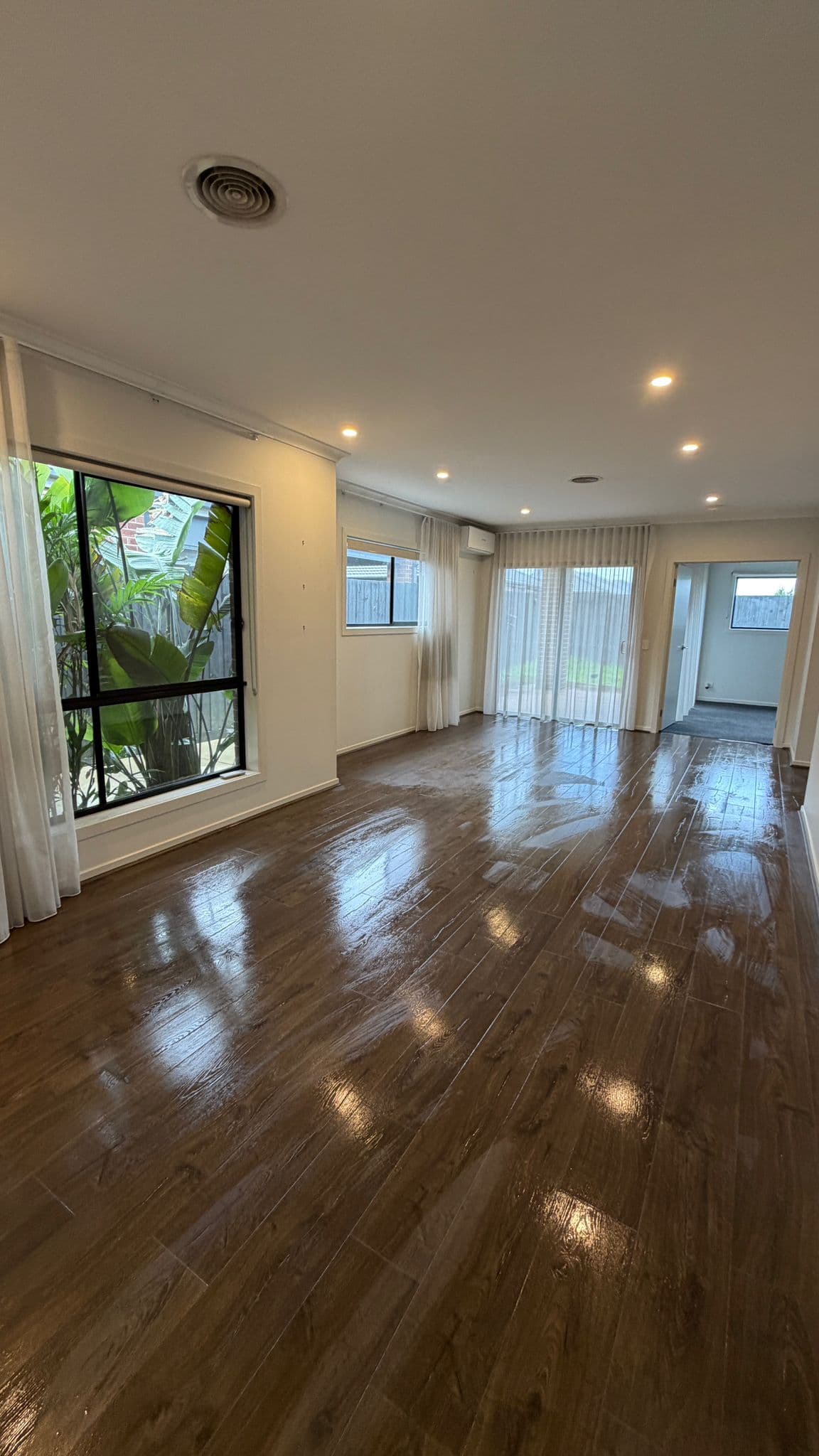 Polished timber floors in a freshly cleaned living area