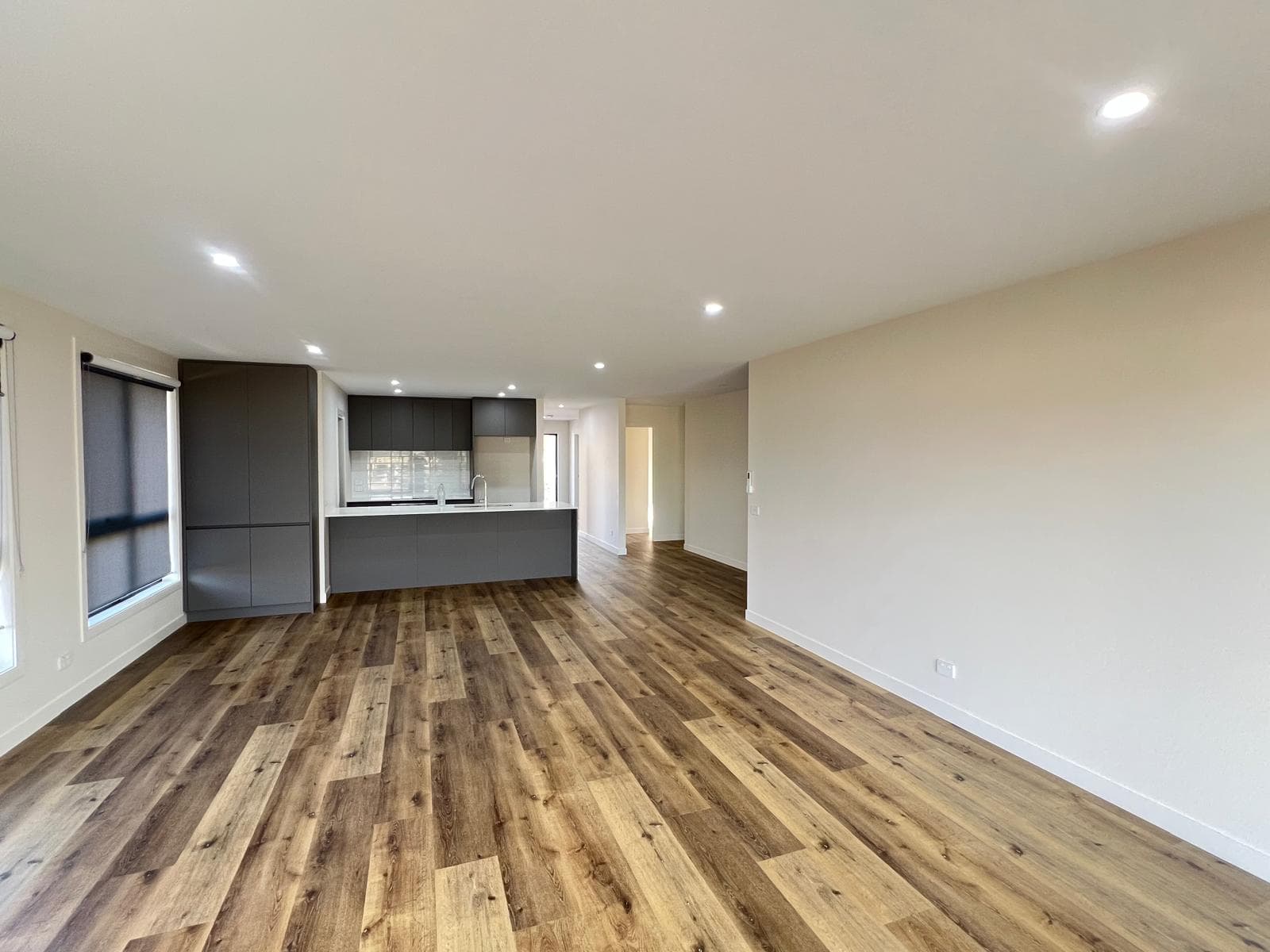 Open-plan living and kitchen left spotless top to bottom