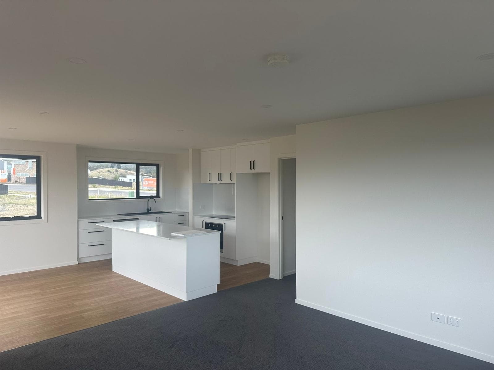 Newly painted open-plan interior in a clean white finish